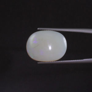 โอปอลธรรมชาติสีขาวคุณภาพดี ได้รับการรับรองจาก IGI น้ำหนัก 8.04 กะรัต รูปทรงวงรี ขนาด 18x14 มม. ขัดเงา HC  ลงแว็กซ์/น้ำมันเพื่อความเงางาม - Product Image 1