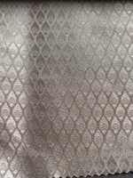 Tissu brocart à motif de feuillage, tissé jacquard, avec motif butti en relief et sequins