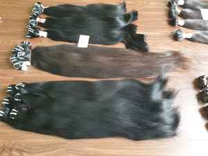 Venta al por mayor de pelo Remy ondulado natural alineado con cutícula completa vietnamita, extensión a granel, procesamiento químico de alta calidad, barato - Product Image 2