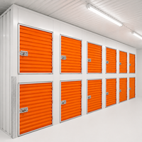 Unité de stockage autonome moderne à deux niveaux avec compartiments de rangement en acier et portes enroulables orange pour entrepôt intérieur, ferme et supermarché