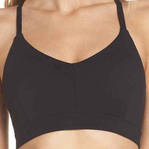 Sujetador deportivo sin costuras para mujer, con tirantes cruzados, cuello redondo, soporte medio, para yoga, color negro sólido, tela elástica transpirable - Product Image 2