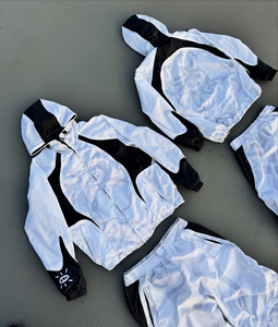 Conjunto deportivo de dos piezas con chaqueta cortavientos y pantalones de chándal con cremallera, de nailon, de alta calidad, para hombre, libre de impuestos en EE. UU. - Product Image 2