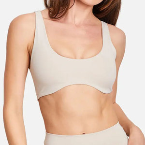 Sujetador deportivo sin costuras para mujer, espalda cruzada, cuello redondo, diseño recortado, soporte medio, para yoga, color liso, elastano, poliéster - Product Image 1