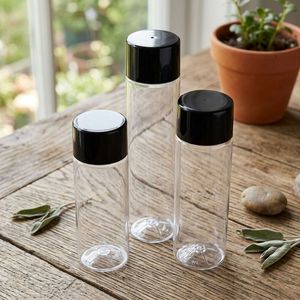 Botella de Agua Cilíndrica Transparente de PET con Tapa Negra para Envasado de Jugos, Té y Bebidas Funcionales, Logotipo Personalizado, Fábrica en Vietnam - Product Image 2