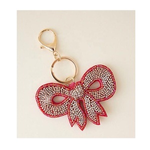 Breloque de sac en perles de verre avec nœud rose, à accrocher aux clés ou comme breloque de sac pour filles, pour sac à main, pochette ou clé de voiture, accessoire cadeau d'anniversaire - Product Image 1