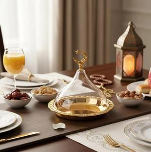 Plateau en métal finition or luxueux avec couvercle en verre et poignée en forme de croissant de lune pour servir des bonbons, des collations et des présentations festives, provenant d'Inde. - Product Image 3