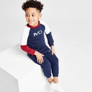 Survêtement de performance Junior Circuit pour enfants |   Veste d'entraînement orange vif à fermeture éclair intégrale avec pantalon de jogging à rayures latérales contrastées bleu marine - Product Image 2