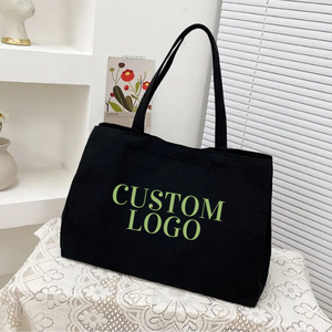 Bolsa portafolio de lona negra para artistas, hecha de 100% algodón puro, para un look elegante y de marketing. - Product Image 1