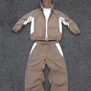 Ensemble de survêtement unisexe en nylon coupe-vent à capuche, deux pièces, avec veste zippée et pantalon de jogging, personnalisable OEM pour l'hiver - Product Image 4