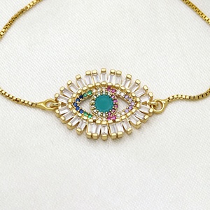 Pulsera ajustable de plata de ley 925 bañada en oro con circonitas baguette y ojo turco, joyería fina al por mayor, Memoria Jewels - Product Image 2