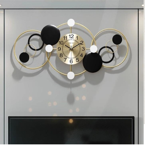 Unique contemporary golden circular frame <b>clock</b> showcases layered overlapping crescent designs, available at wholesale prices. - Product Image 3