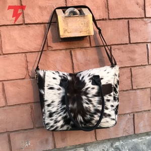 Nouveau style, prix raisonnable, sac fourre-tout décontracté unisexe en cuir véritable, fermeture à glissière, imperméable, léger, vente en gros TORQSON - Product Image 1