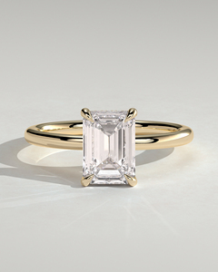 แหวนเพชรเม็ดเดี่ยวทรงเหลี่ยมมรกต 2 กะรัต ทองคำแท้ 14K ฝังเพชรแล็บโกรว์ E VVS2 พร้อมวงแหวนซ่อนแบบ Halo ดีไซน์หรูหราสำหรับเจ้าสาว ปี 2026 - Product Image 1