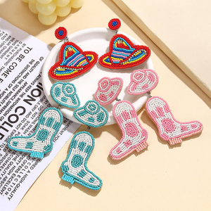Pendientes de Mariposa Bohemios Hechos a Mano con Cuentas de Arroz y Estilo Vaquero Occidental Vintage para Regalo 2025 BY MULTI CRAFT - Product Image 1
