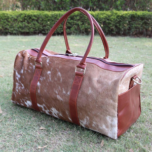 Premium cowhide leather hair on travel <b>bags</b> wholesale supplier OEM custom logo handmade export fashion luggage <b>bags</b> for sale - Product Image 5
