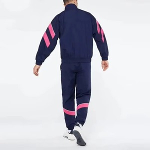 Ensemble de survêtement à capuche coupe-vent pour homme, idéal pour l'entraînement en extérieur, vente en gros OEM, ensemble de survêtement color block homme bleu marine et rose - Product Image 5