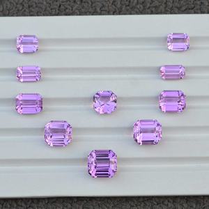 พลอยคุนไซต์สีชมพูอมมุกธรรมชาติ 192 กะรัต เจียระไนทรงแปดเหลี่ยม ความเงางามสูง เหมาะสำหรับทำสร้อยคอ ความใสระดับ VVS พลอยคุนไซต์แบบเม็ด - Product Image 1