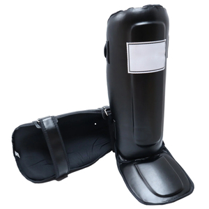 Guantes de Boxeo de Cuero PU con Logotipo Personalizado OEM, Protectores de Espinilleras de Alta Calidad, Protección Integral, Cierre con Cordones, Transpirables - Product Image 1