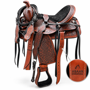 Silla de montar western ABAAN International de cuero marrón premium con grabado floral y estructura de madera con tejido de cesta - Product Image 1