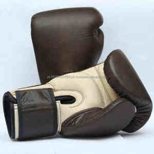 Gants de boxe pour enfants personnalisables OEM en cuir PU engrenages d'entraînement avec des caractéristiques de sécurité extensibles conception et logo personnalisés - Product Image 1