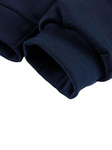 Ensemble de survêtement athleisure évasé avec pantalon fuselé taille haute et sweat à capuche court pour un look élégant et sportif. - Product Image 3