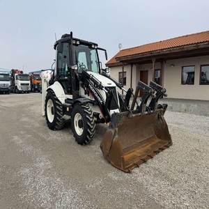 Machine combinée puissante Hidromek : pelle rétrocaveuse et chargeuse frontale avec moteur diesel et boîte de vitesses durables - Product Image 1