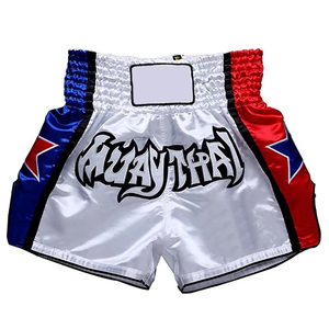 Shorts de Muay Thai en satin blanc de qualité supérieure avec panneaux latéraux rouges et bleus - Shorts de kickboxing professionnels - Vêtements d'entraînement MMA - Product Image 1