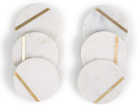 Sous-verres de luxe écologiques en marbre blanc avec élégantes rayures dorées, esthétiques et isolants thermiquement