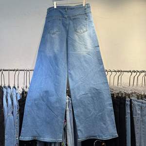 Jeans amples taille haute en denim respirant et amincissant pour femme, nouvelle collection automne 2026, vente en gros pour boutiques - Product Image 5