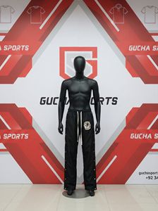 Pantalon de jogging pour homme avec logo personnalisé, boutons pression, taille élastique avec cordon de serrage, coupe ample, style streetwear, fabrication OEM, vente en gros. - Product Image 2