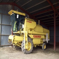 Moissonneuse-batteuse à deux rangs haute performance pour blé, riz et ail, avec moteur diesel puissant et boîte de vitesses robuste, 110-130 CV
