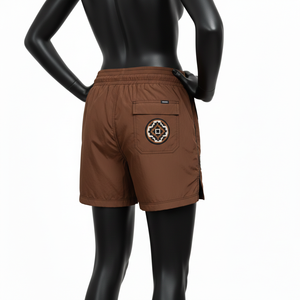 Shorts cortavientos de poliéster ligero de 135 GSM, color marrón, estilo urbano, con parche bordado y logotipo personalizado para mujer. - Product Image 5