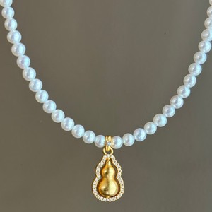 สร้อยคอผู้หญิงระดับไฮเอนด์ บาโอหู ดีไซน์เก๋ไก๋ ด้วยด้ายสีทอง ประดับจี้รูปน้ำเต้า หมุนได้ พร้อมไข่มุกใหม่ ดีไซน์หรูหรา - Product Image 3