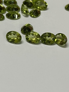 เพอริดอทดิบสีเขียวธรรมชาติ รูปไข่ ขนาด 6x8 มม. คุณภาพดี สะอาด ระดับ Loupe ได้รับการรับรองจาก IGI โดย Sadiya International - Product Image 4