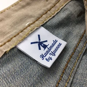 ป้ายทอผ้าพับกลางสำหรับเสื้อผ้า พร้อมโลโก้และขนาดแบรนด์ที่กำหนดเอง - Product Image 2