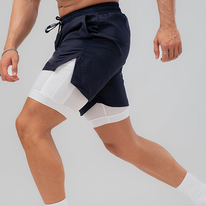 Shorts de sport pour homme bleu foncé 2 en 1, séchage rapide, respirant, coupe-vent, avec cordon de serrage, shorts de sport actifs - Product Image 1