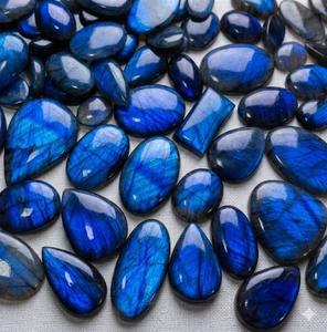 ลาบราดอไรต์สีน้ำเงินคุณภาพสูง 100% แท้ พร้อมคริสตัลสีฟ้าแบบคาโบชอง  หินพลังบำบัด จำหน่ายส่งจำนวนมาก - Product Image 1