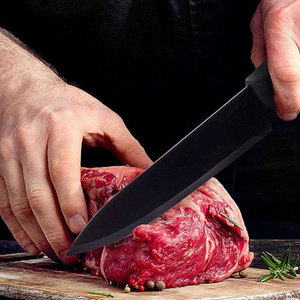 Cuchillo de chef de acero inoxidable de calidad profesional con diseño equilibrado y mango cómodo para un corte preciso de alimentos - Product Image 6
