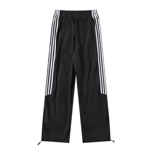 Pantalon de survêtement unisexe noir rayé, taille élastique, coupe ample, longueur intégrale, style sportif, poches latérales, polyester, pour adulte, collection printemps - Product Image 2