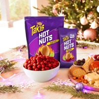 Chips de tortilla Takis croustillantes avec assaisonnement au chili et au citron vert, offrant une forme roulée unique et une saveur délicieuse