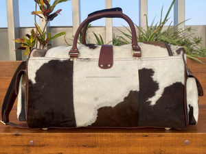 Travel Cowhide Haironกระเป๋าเดินทางกระเป๋าVINTAGEค้างคืนหนังDuffleตั้งแคมป์เดินป่ากระเป๋าHandmadeกระเป๋าวีคเอนด์สําหรับผู้ชายและผู้หญิง - Product Image 5