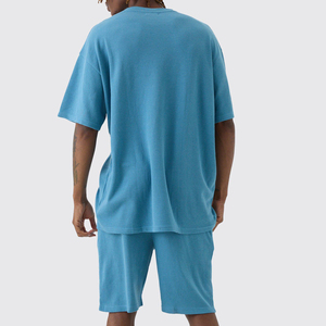 เสื้อยืดผู้ชายสีน้ำเงิน ผ้าวาฟเฟิล คอวี แขนสั้น มีโลโก้ด้านหน้า สวมใส่สบายๆ ในฤดูร้อน - Product Image 3