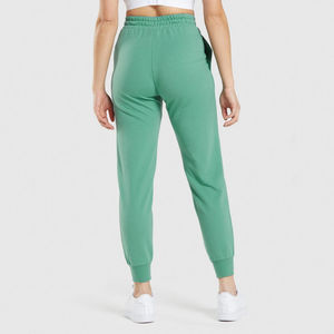 กางเกงสตรีทแวร์สีพื้นทรงหลวมสไตล์ลำลอง กางเกงสตรีทแวร์น้ำหนักเบา กางเกงวอร์มขาย - Product Image 3