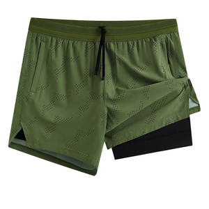 Shorts de tennis pour hommes en polyester de haute qualité, légers, à taille élastique avec cordon de serrage, extensibles, respirants et à séchage rapide - Product Image 1