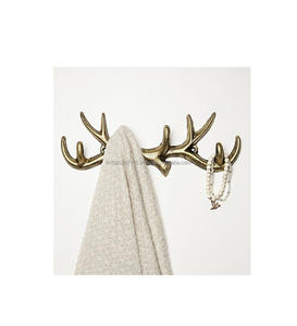 Wall <b>hooks</b> made of solid brass with artistic handcrafted detailing suitable for vintage home settings and modern contrast decor - Product Image 1