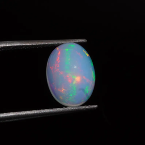โอปอลสีขาวธรรมชาติแบบคาโบชอง 3.30 กะรัต รูปไข่ พลอยเอธิโอเปีย มีการเปลี่ยนสี เหมาะสำหรับทำเครื่องประดับ - Product Image 4