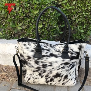 Nouveau style, prix raisonnable, sac fourre-tout décontracté unisexe en cuir véritable, fermeture à glissière, imperméable, léger, vente en gros TORQSON - Product Image 6