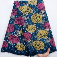 Tissu en dentelle suisse africaine brodé et perlé pour fabricants de vêtements et acheteurs de textiles au Royaume-Uni
