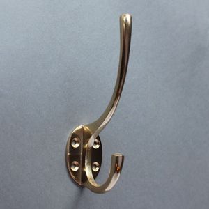 Contemporary brass wall <b>coat</b> <b>hook</b> for organized storage featuring durable craftsmanship and decorative household styling - Product Image 1