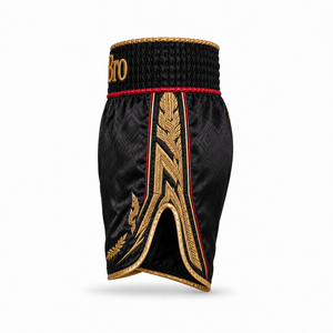 Shorts de Muay Thai personnalisés KhumBro noir, orange et or, en satin brodé de qualité supérieure, pour la boxe, le kickboxing et les combats, unisexe, 100 % polyester - Product Image 3